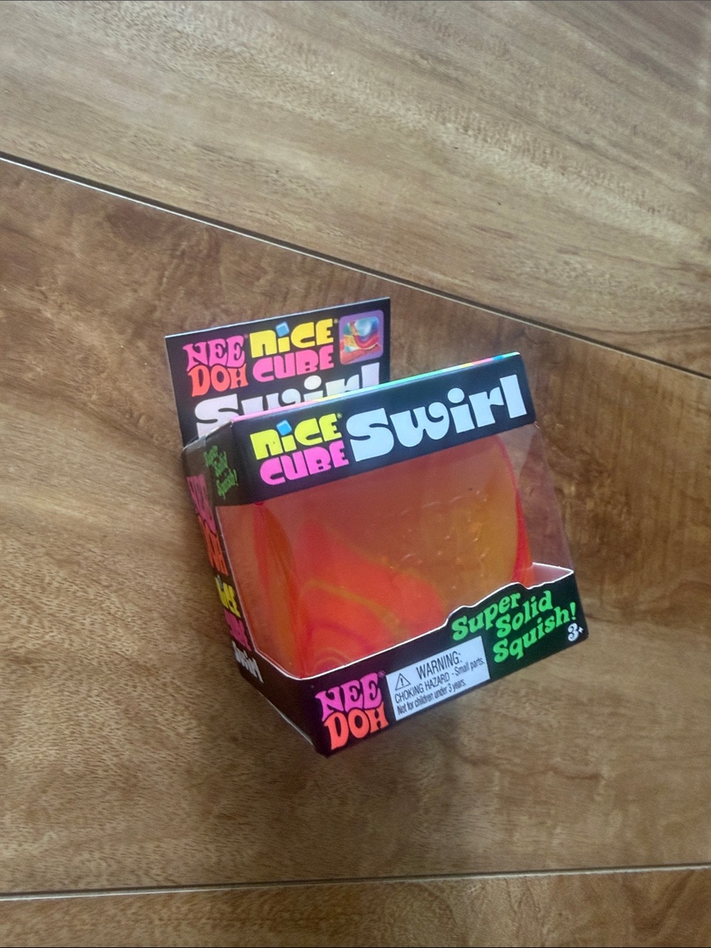 Nee Doh Nice Cube Swirl Super Solid Squish Orange Cube